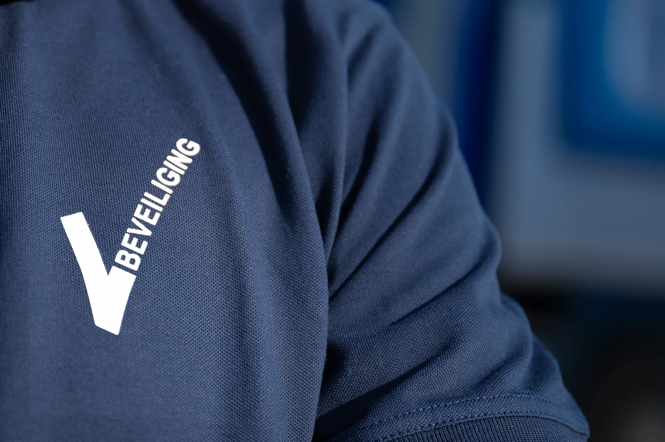 Mouw met opschrift Beveiliging van Nijhuis Beveiliging in detail